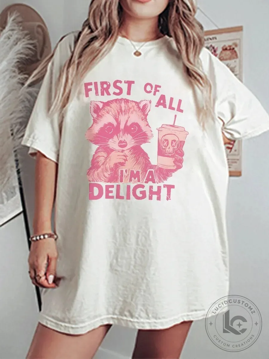 First Of All I'm A Delight Raccoon Holding Coffee Cup Graphic T-Shirt